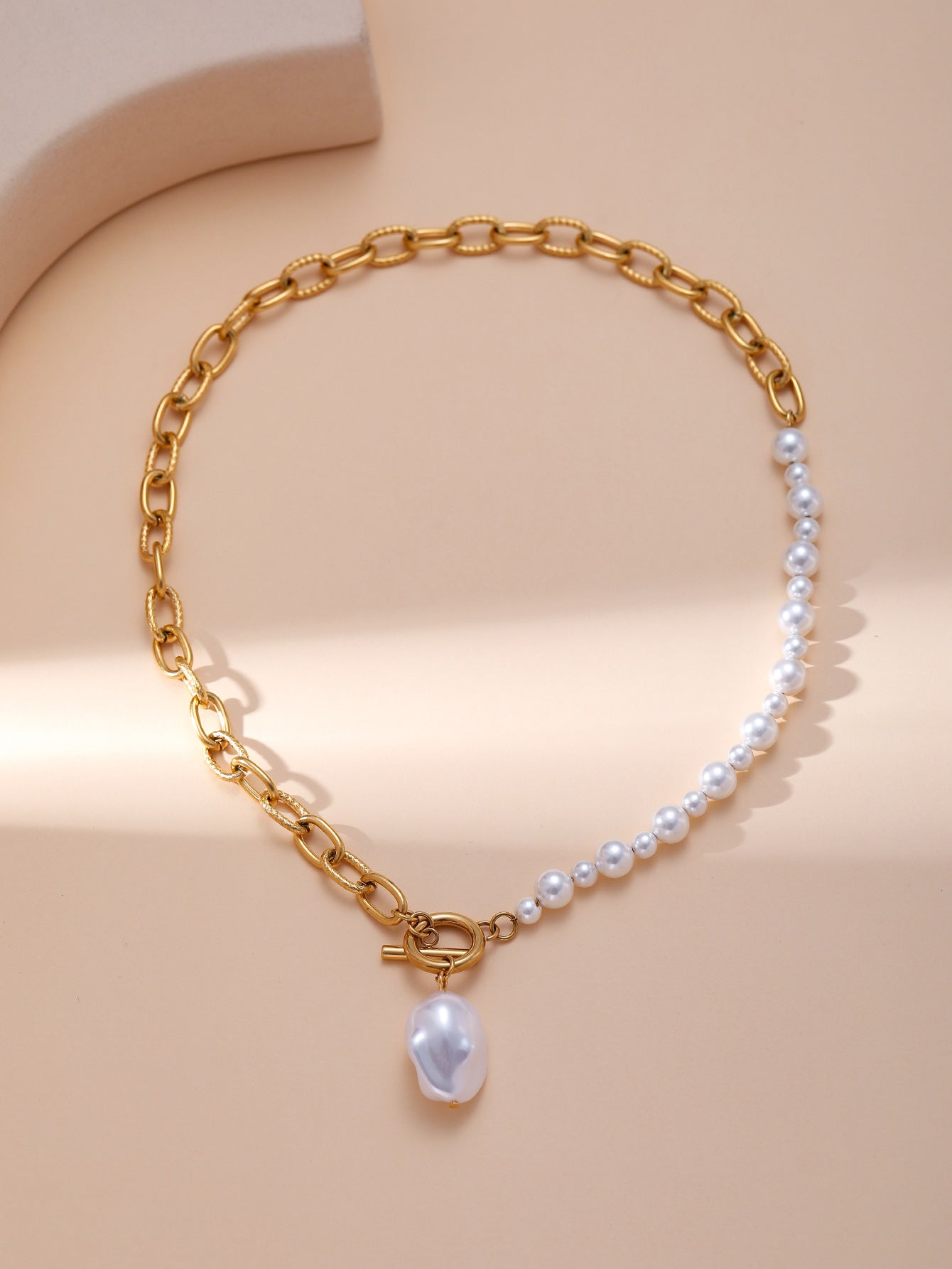Stainless steel, gold plated, baroque style pearls